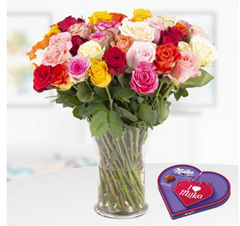 Bild zu 40 Bunte Rosen (40cm) + I love Milka (44g) für 25,90€